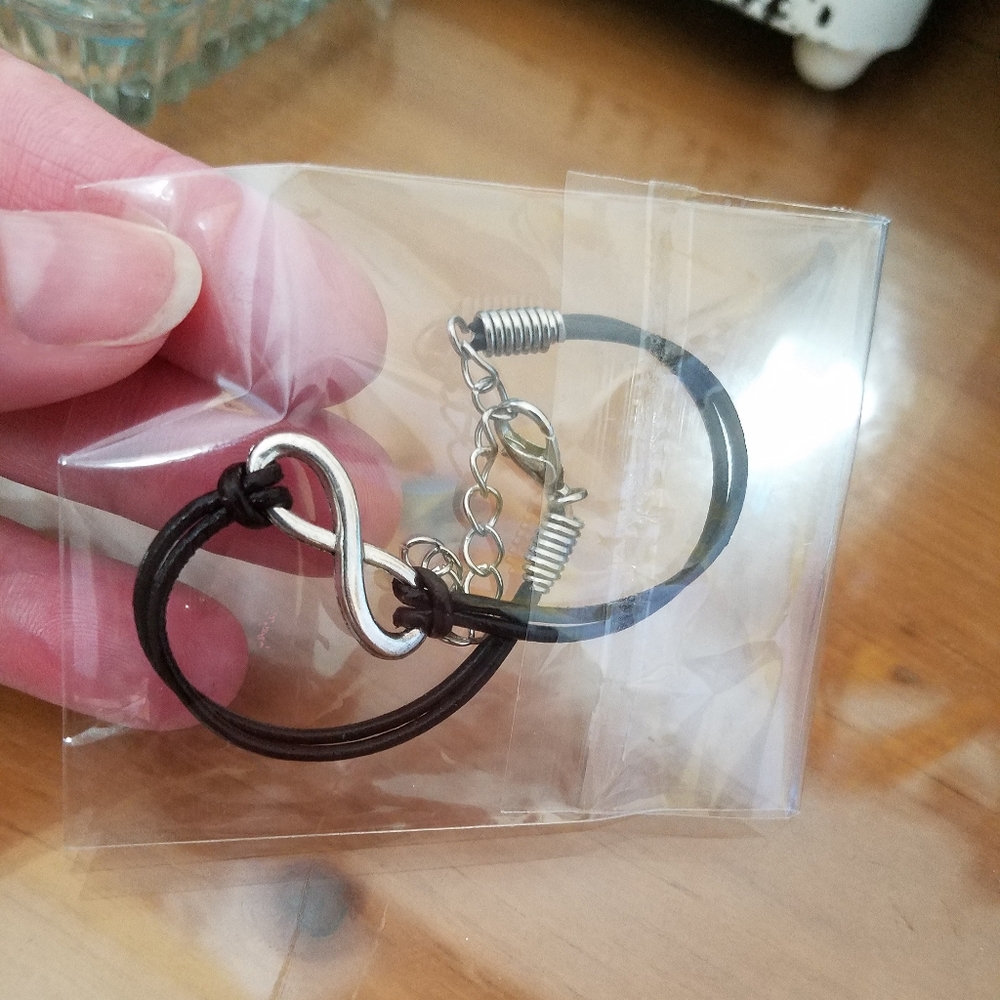 Leather and Silver Tone Infinity Bracelet NIB!